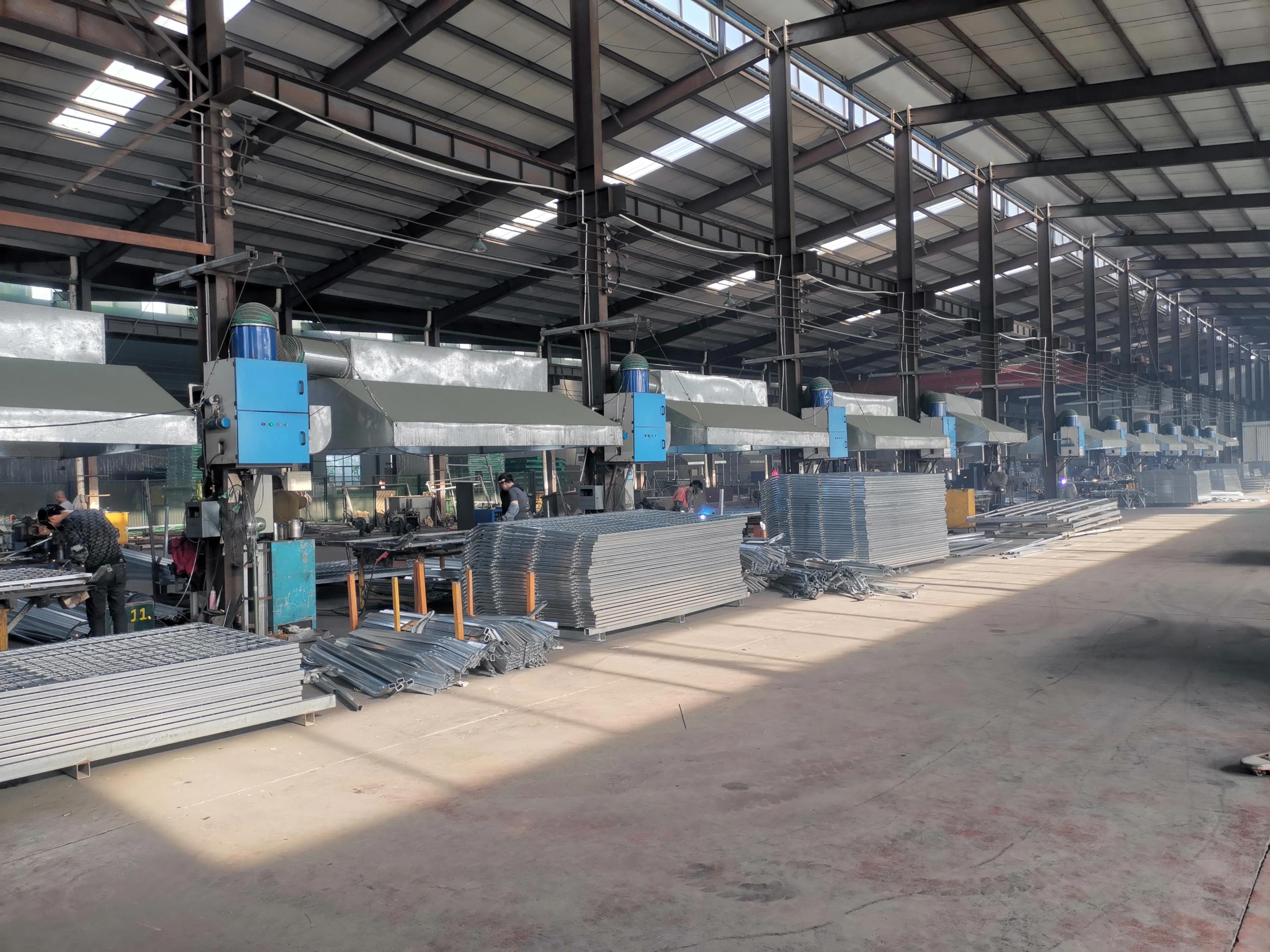 Welding machines on the Giantfence factory floor